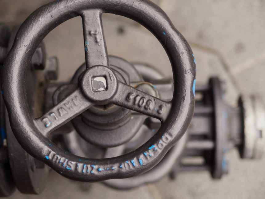 Large old valve on the water pipe