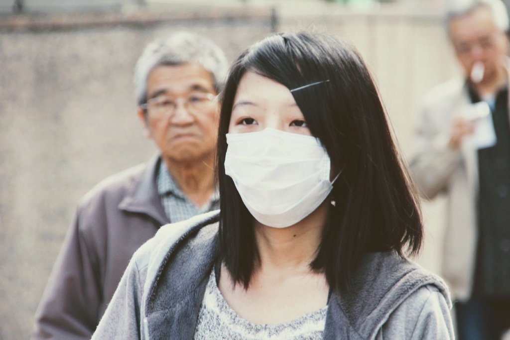 Asian woman wearing a face mask